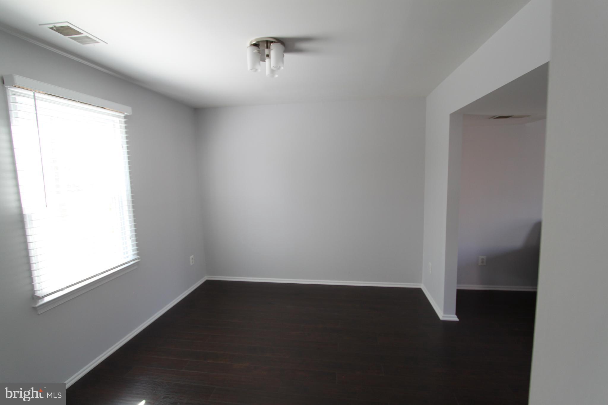 5525 Miles Court Springfield, VA 22151 - Photo 4 of 28 Dining Room Freshly Painted and with New Floors