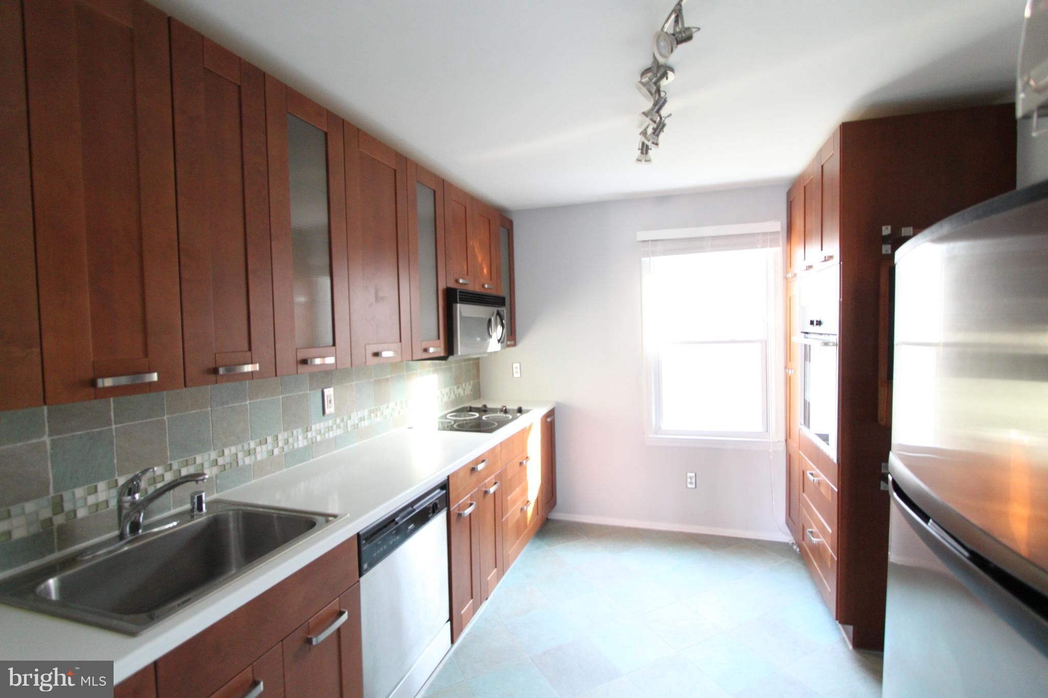 5525 Miles Court Springfield, VA 22151 - Photo 6 of 28 Bright Kitchen w/Tiled Floor