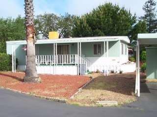49 Cardinal Way Santa Rosa, CA 95409 - Photo 1 of 1 a front view of a house with a yard