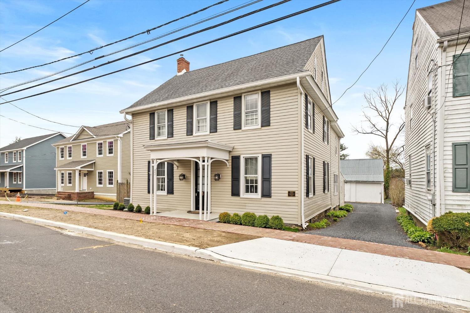 442 Ellisdale Road Chesterfield, NJ 08515 - Photo 1 of 42 a front view of a house with a yard