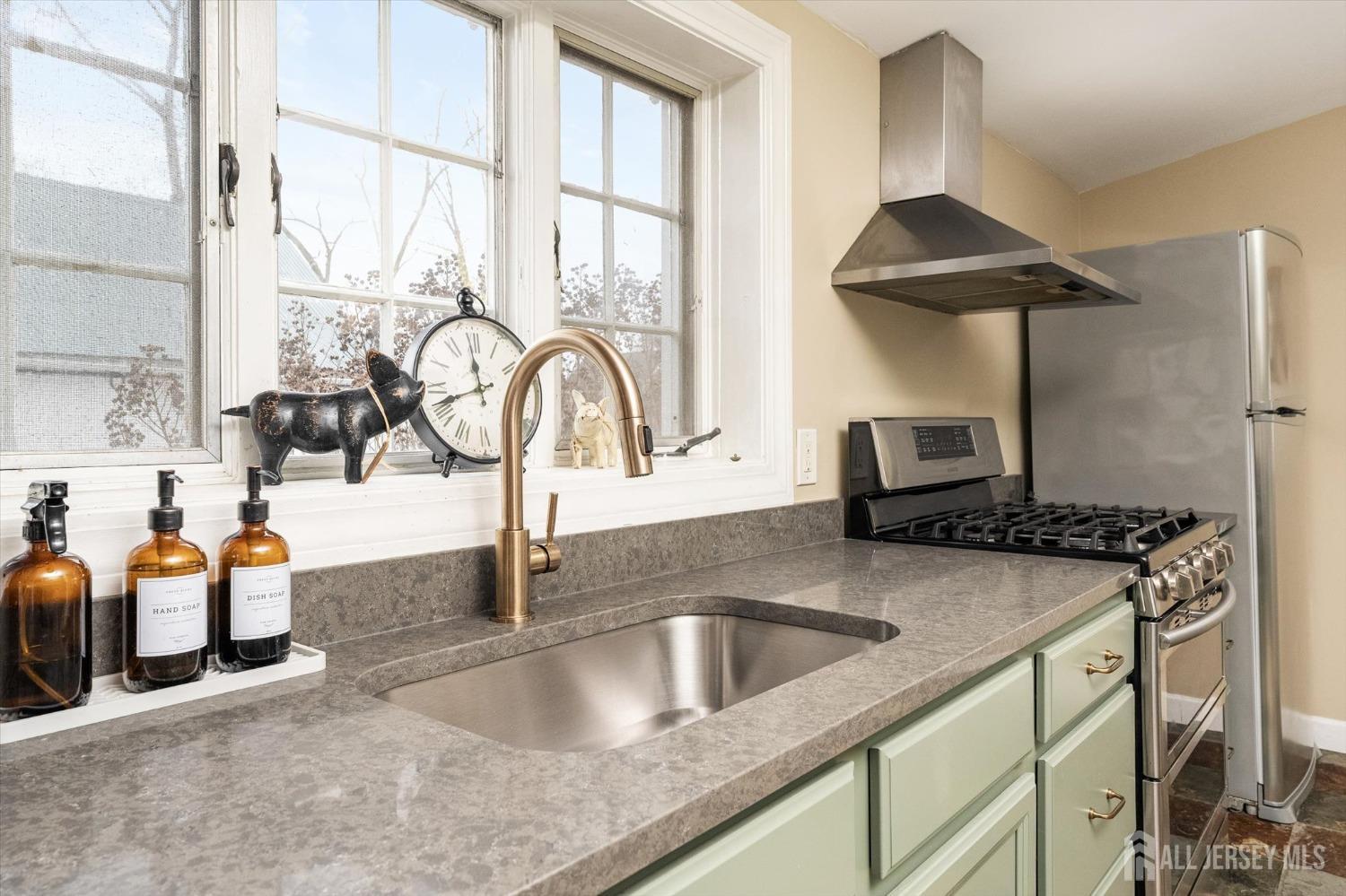 442 Ellisdale Road Chesterfield, NJ 08515 - Photo 15 of 42 a kitchen with stainless steel appliances granite countertop a sink and a counter space