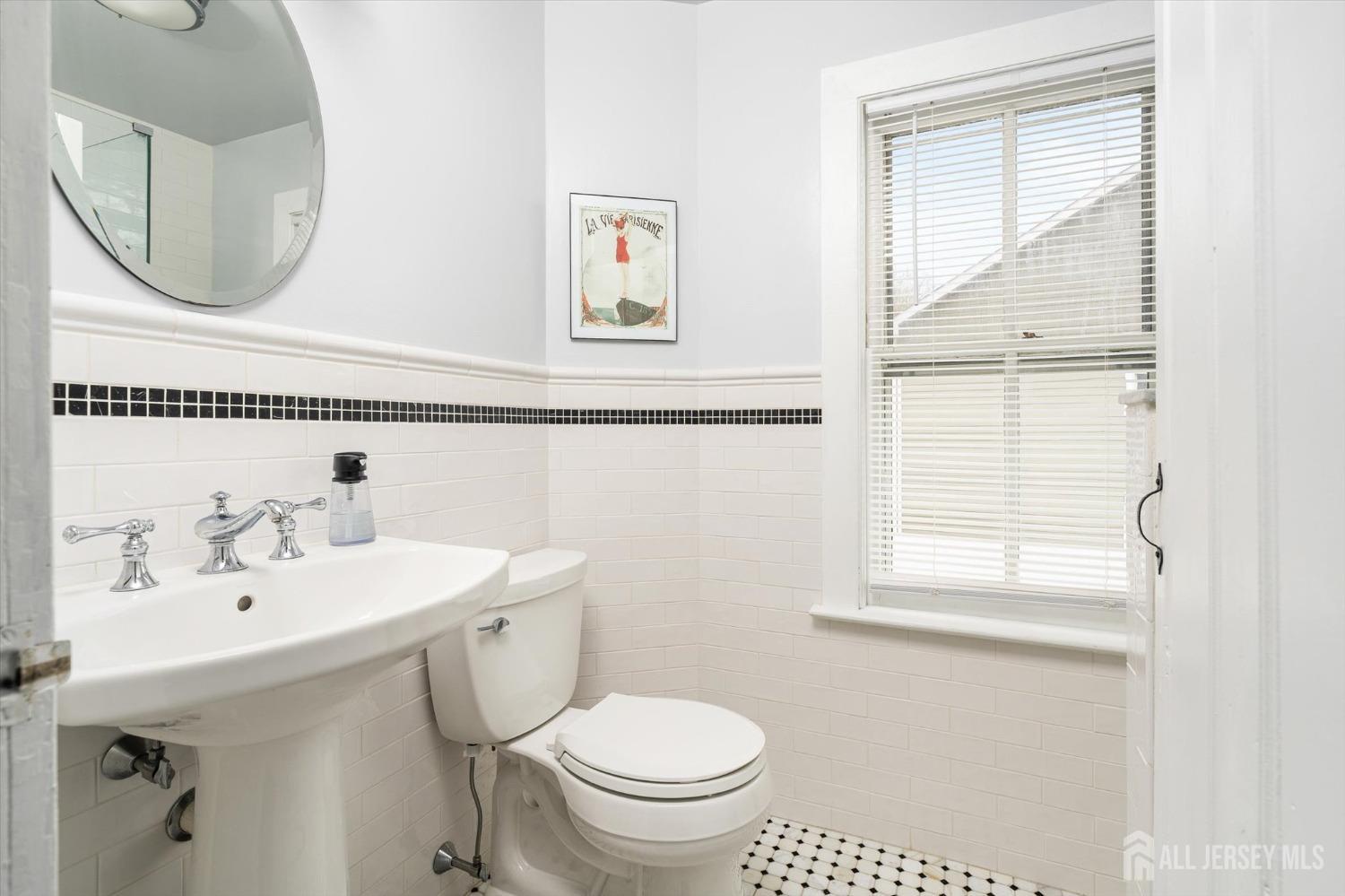 442 Ellisdale Road Chesterfield, NJ 08515 - Photo 24 of 42 a bathroom with a sink a toilet and a mirror