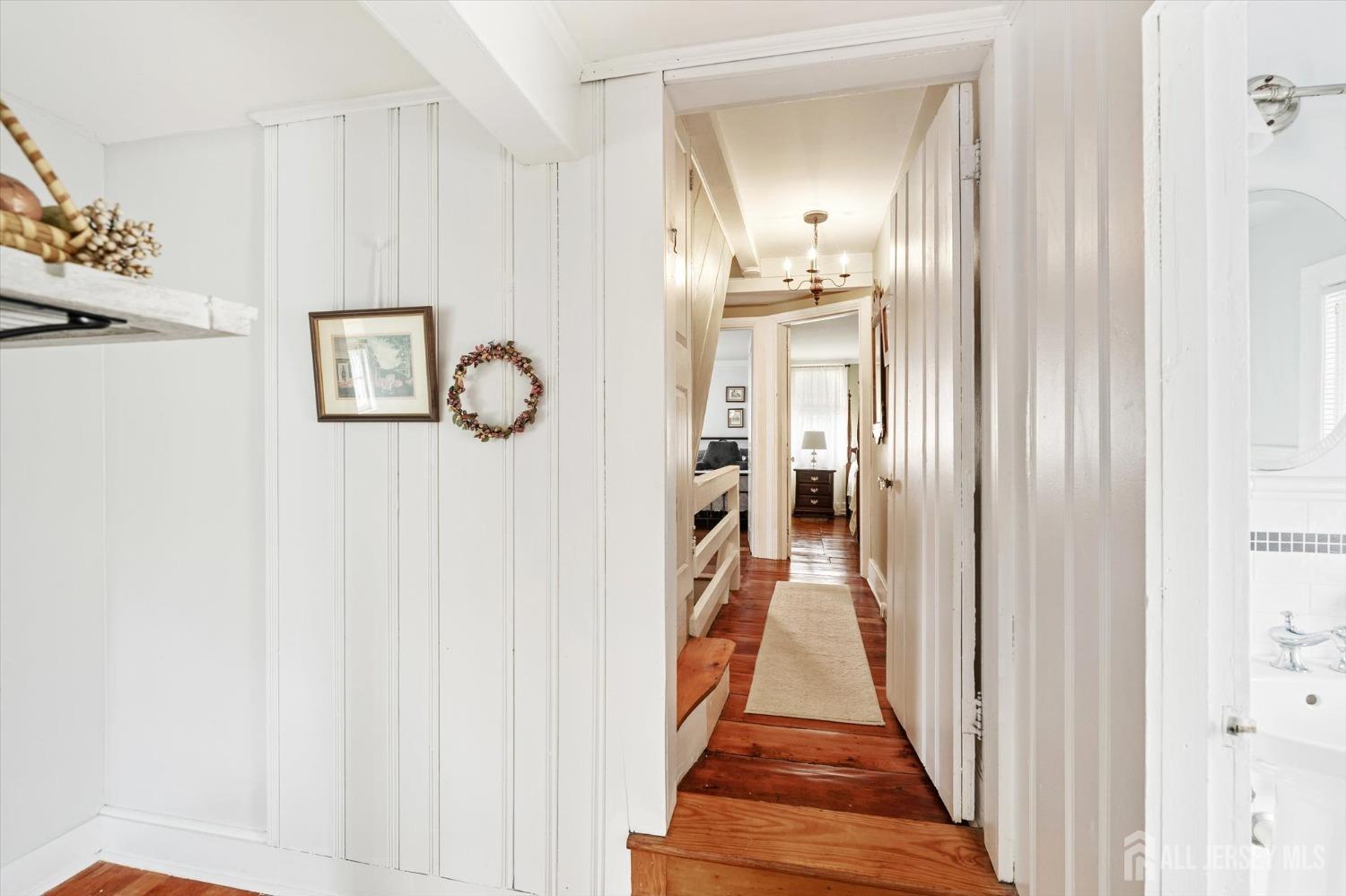 442 Ellisdale Road Chesterfield, NJ 08515 - Photo 28 of 42 a view of a hallway with wooden floor