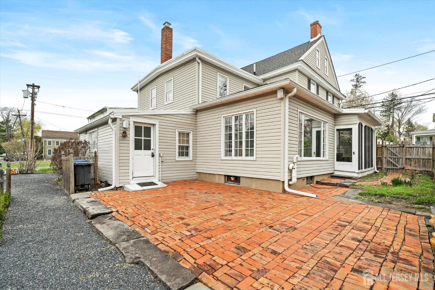 442 Ellisdale Road Chesterfield, NJ 08515 - Photo 33 of 42 a front view of a house with a yard