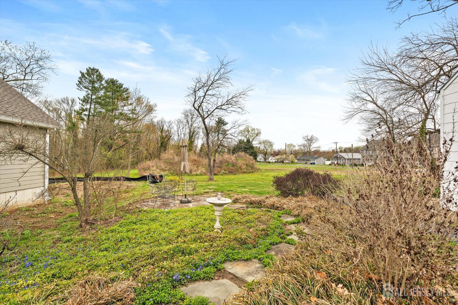442 Ellisdale Road Chesterfield, NJ 08515 - Photo 37 of 42 a view of a yard with an outdoor space