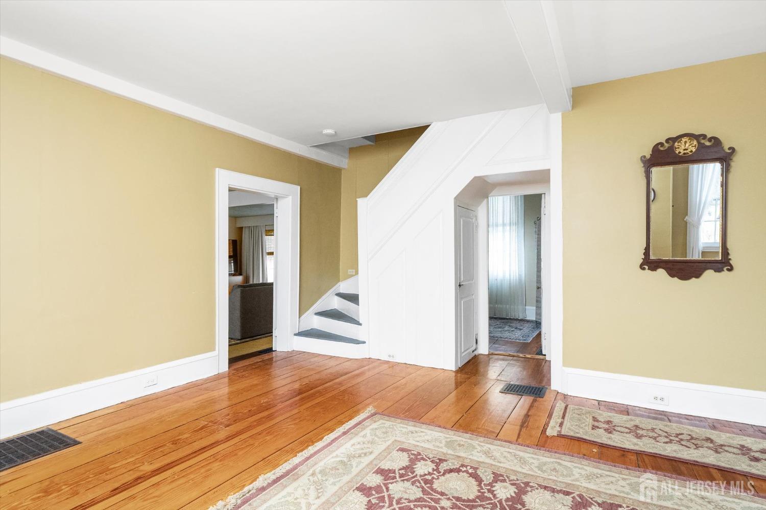 442 Ellisdale Road Chesterfield, NJ 08515 - Photo 4 of 42 a view of a room with wooden floor and closet