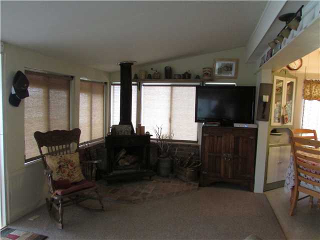 34423 Engineers Road Julian, CA 92036 - Photo 3 of 20 Wood stove for heating. Roll shades on windows and door to deck.