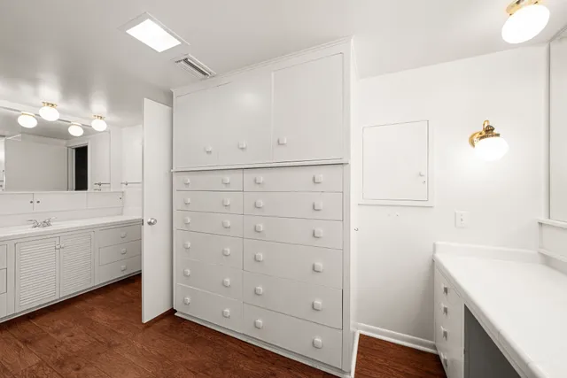a bathroom with a shower and toilet