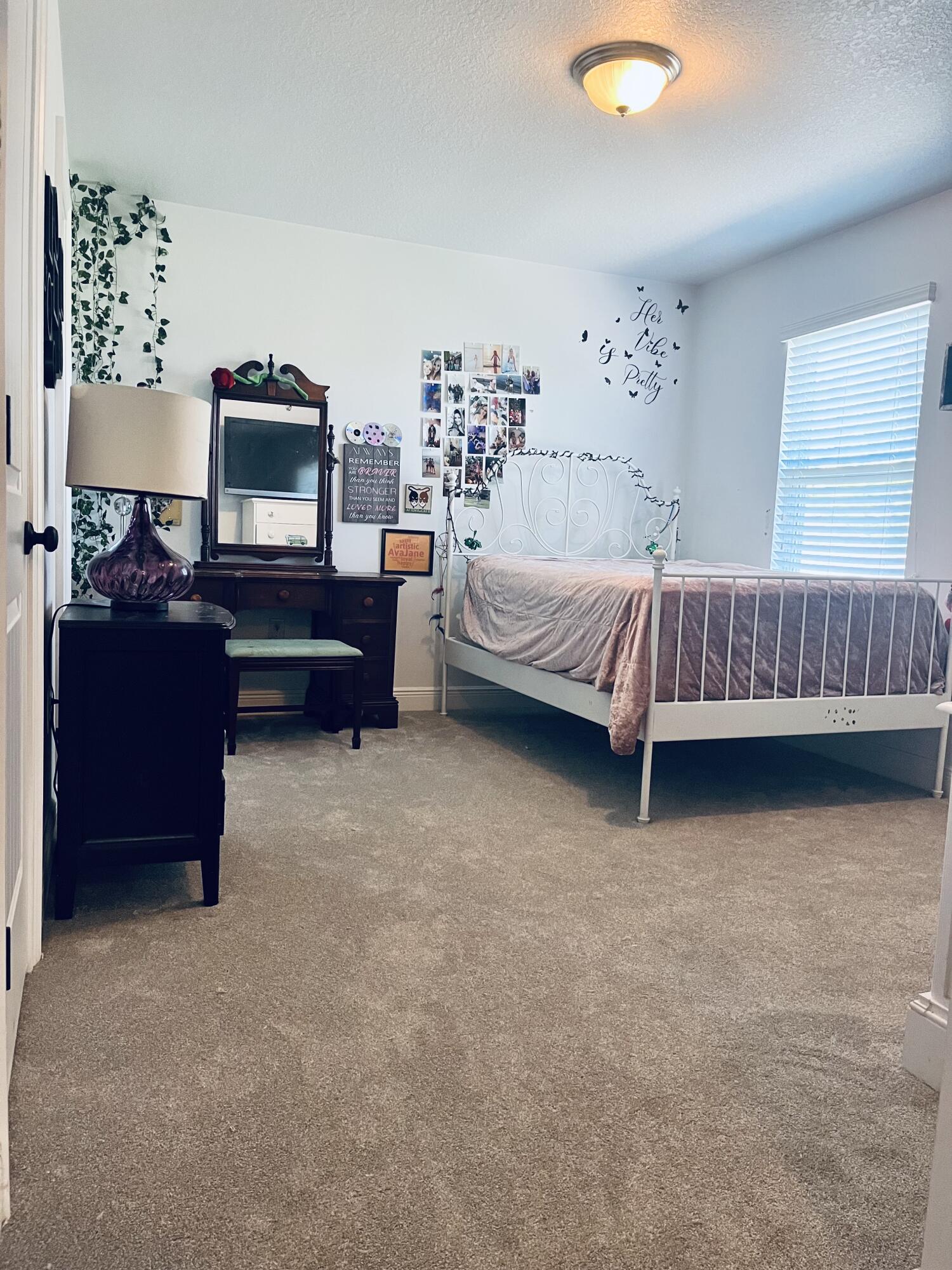 233 Maddox Street Santa Rosa Beach, FL 32459 - Photo 14 of 14 a bed room with a bed and a couch