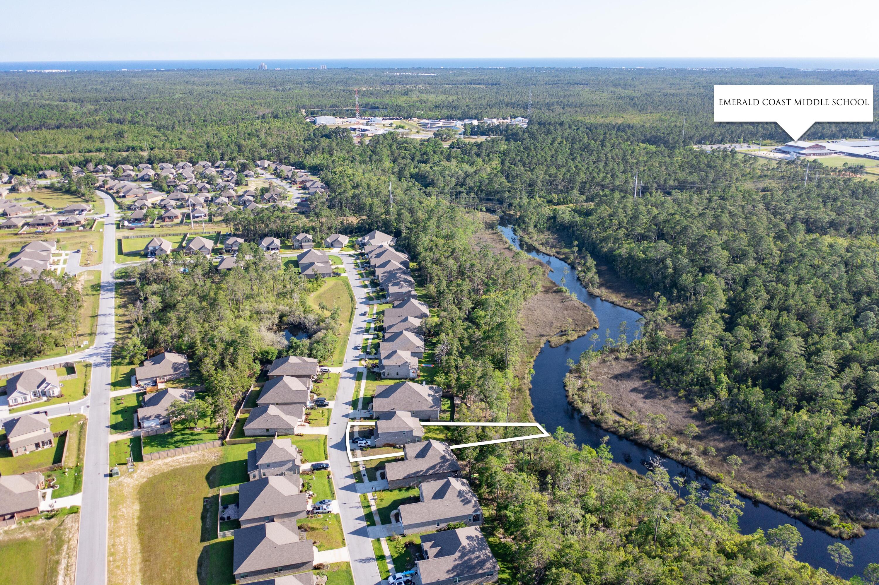233 Maddox Street Santa Rosa Beach, FL 32459 - Photo 3 of 14 an aerial view of multiple house