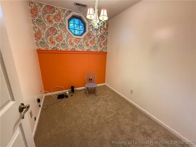 a view of a deck with a fence