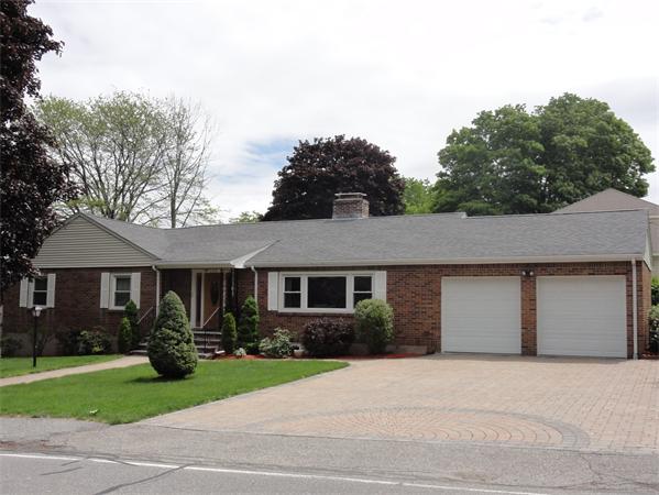 156 Pleasant Street Lexington, MA 02421 - Photo 1 of 28 a front view of a house with garden
