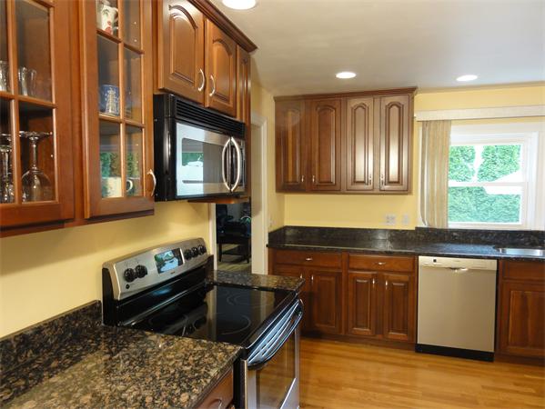 156 Pleasant Street Lexington, MA 02421 - Photo 12 of 28 a kitchen with a stove and a sink