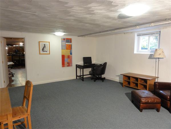 156 Pleasant Street Lexington, MA 02421 - Photo 24 of 28 a living room with furniture and a piano