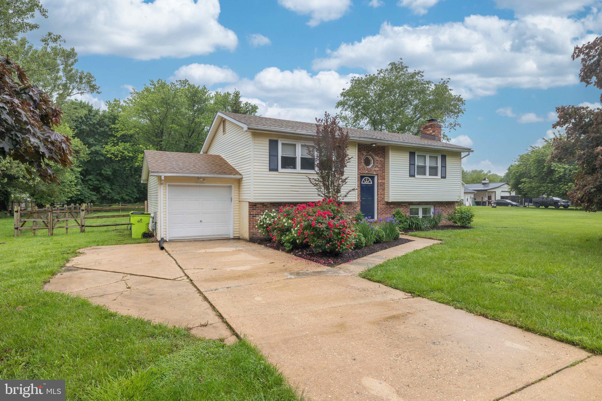 9 Augusta Drive Elkton, MD 21921 - Photo 1 of 21 a front view of a house with garden