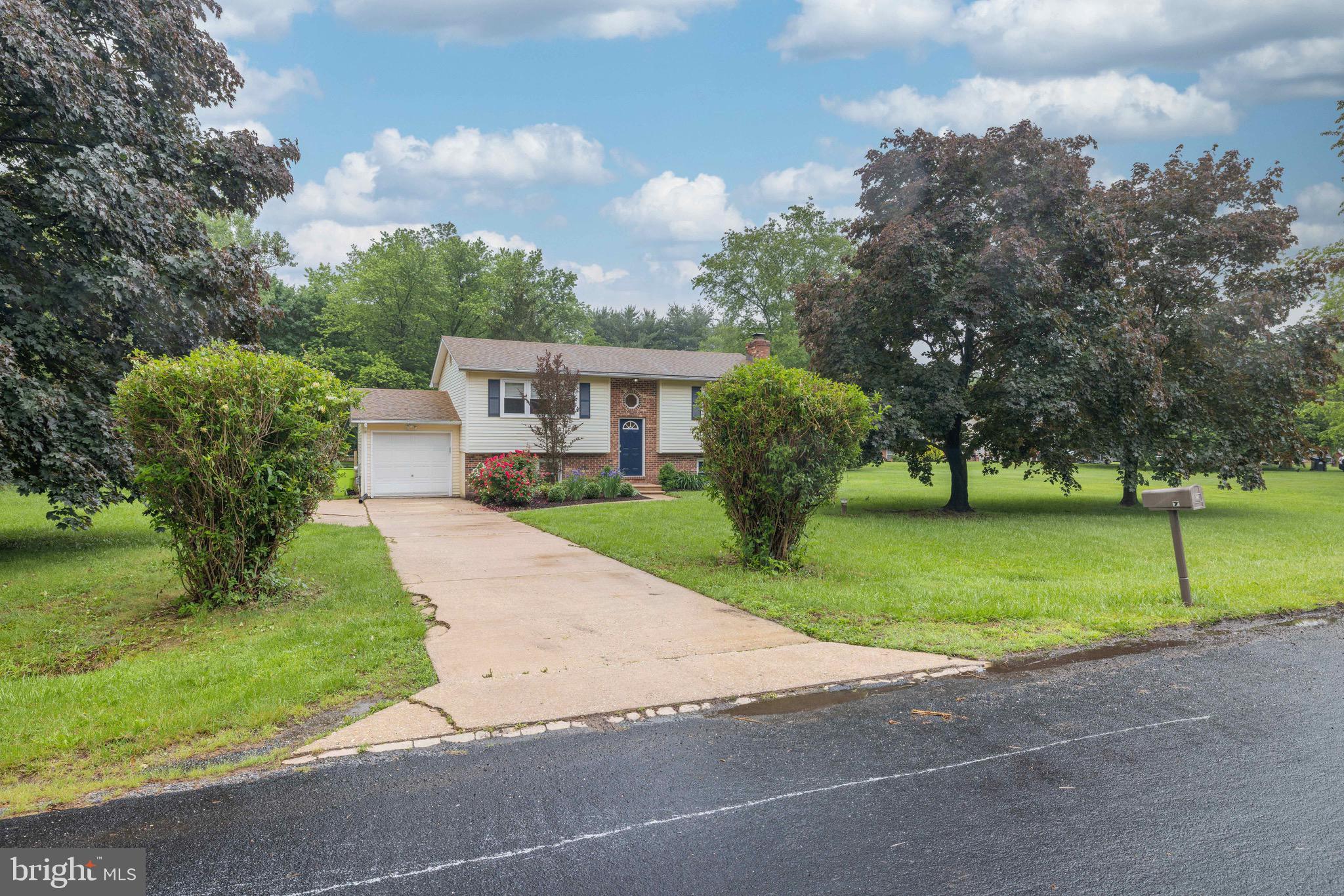 9 Augusta Drive Elkton, MD 21921 - Photo 21 of 21 a front view of a house with a yard and trees