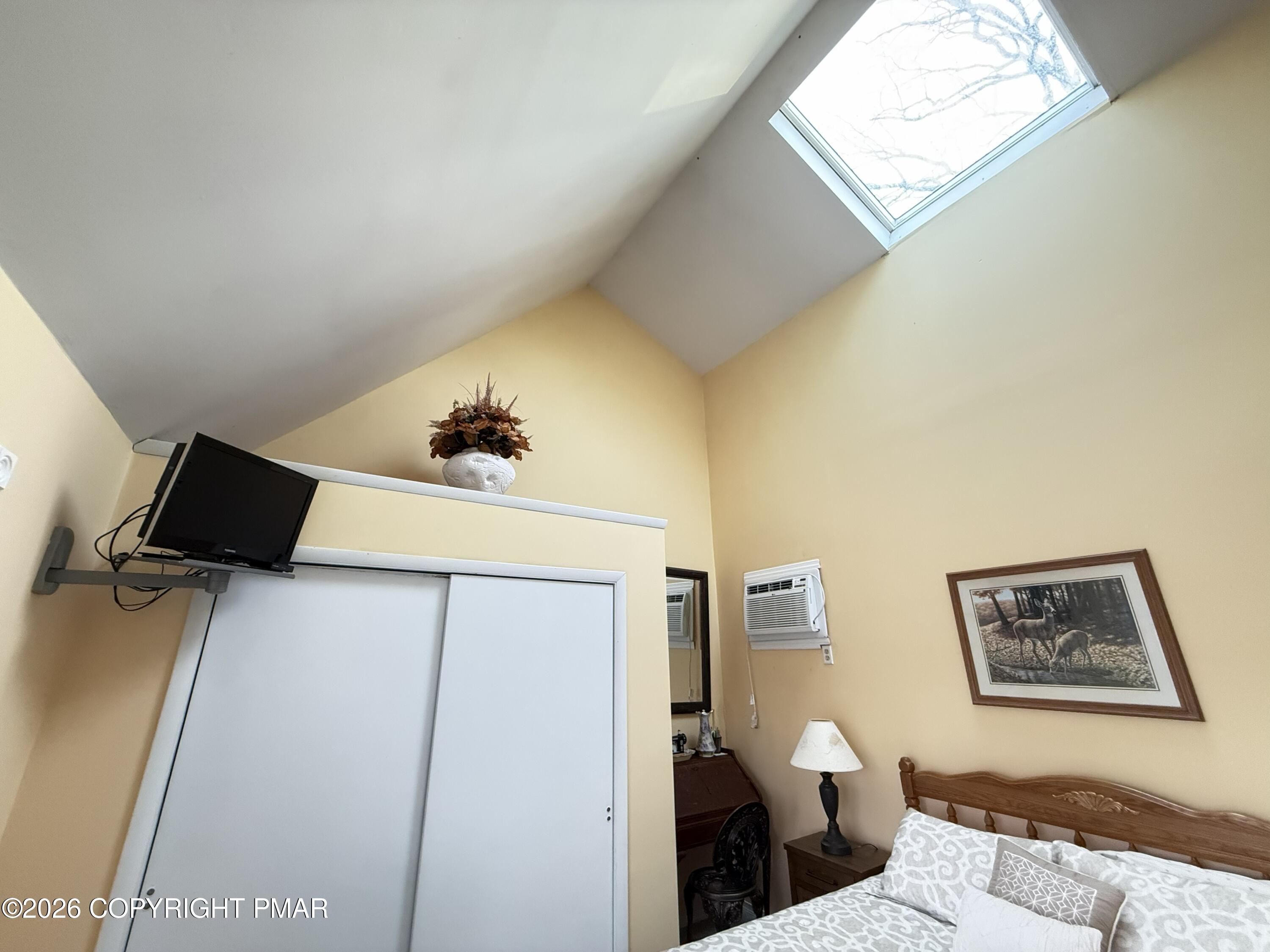 5933 Decker Road Bushkill, PA 18324 - Photo 20 of 51 a bedroom with a bed and a couch