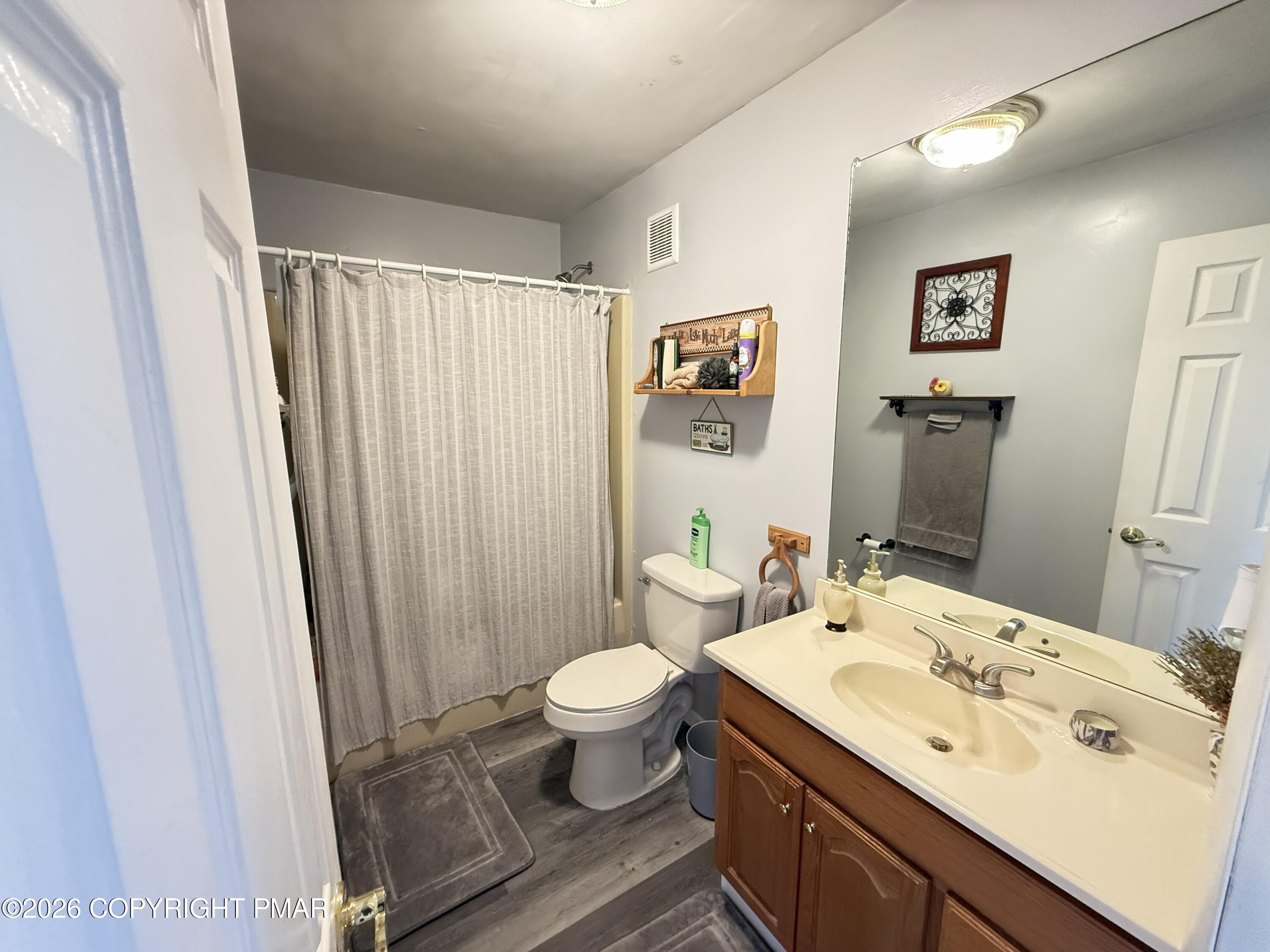 5933 Decker Road Bushkill, PA 18324 - Photo 21 of 51 a bathroom with a sink toilet and shower