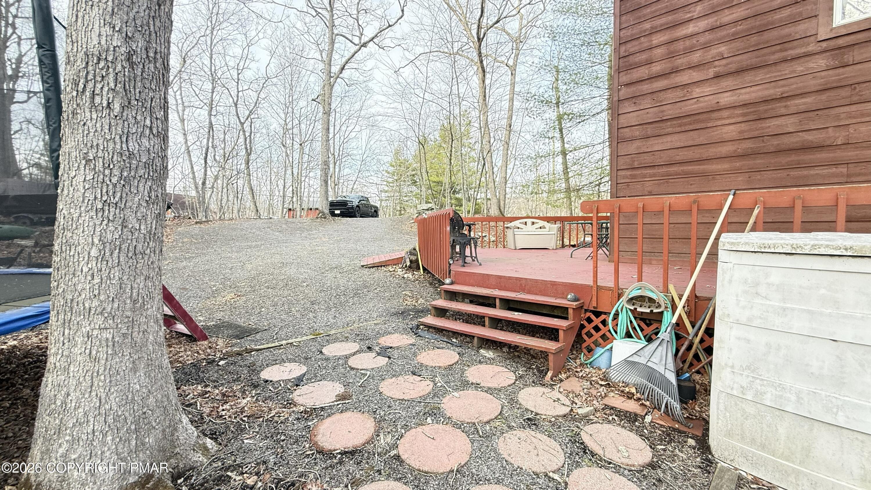 5933 Decker Road Bushkill, PA 18324 - Photo 29 of 51 a outdoor space with a couch and large trees