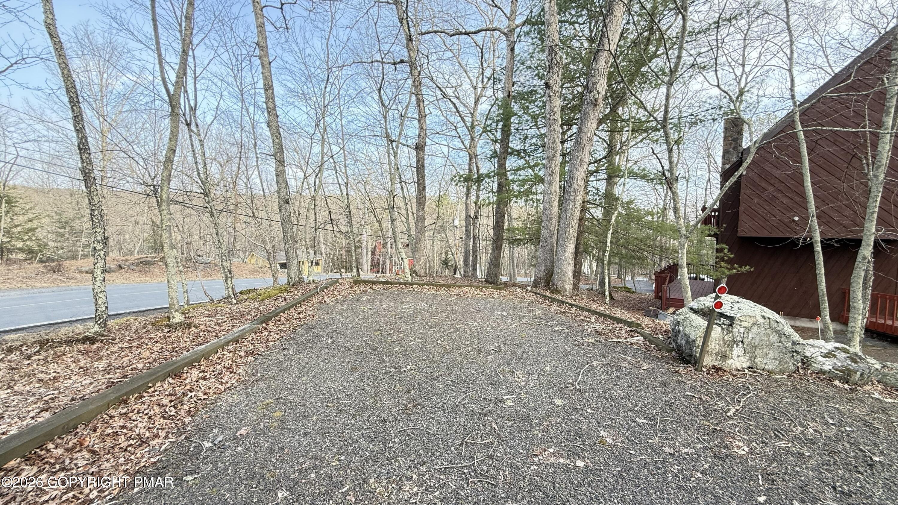 5933 Decker Road Bushkill, PA 18324 - Photo 31 of 51 a view of a backyard with large trees