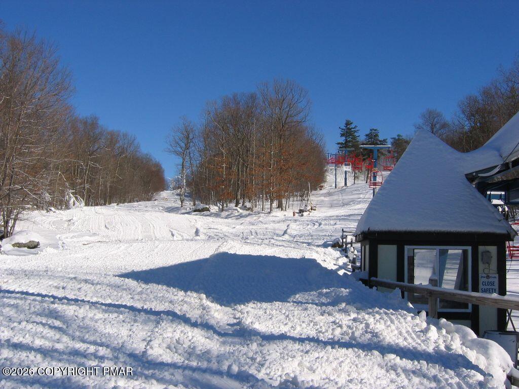 5933 Decker Road Bushkill, PA 18324 - Photo 48 of 51 a view of a house with snow on the yard