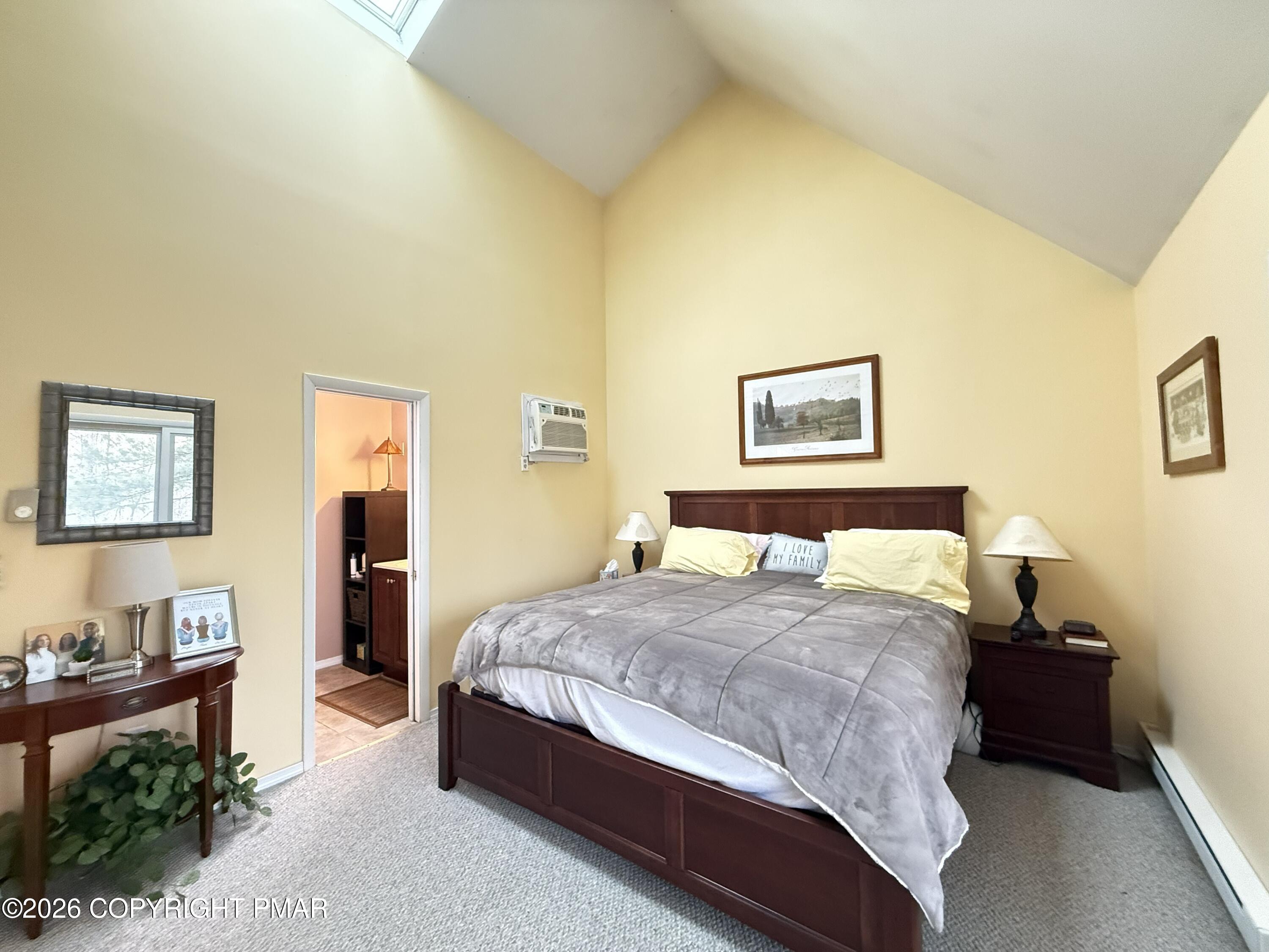 5933 Decker Road Bushkill, PA 18324 - Photo 10 of 51 a bedroom with a bed and a table