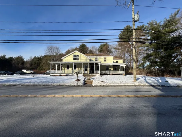 a front view of a house with a patio