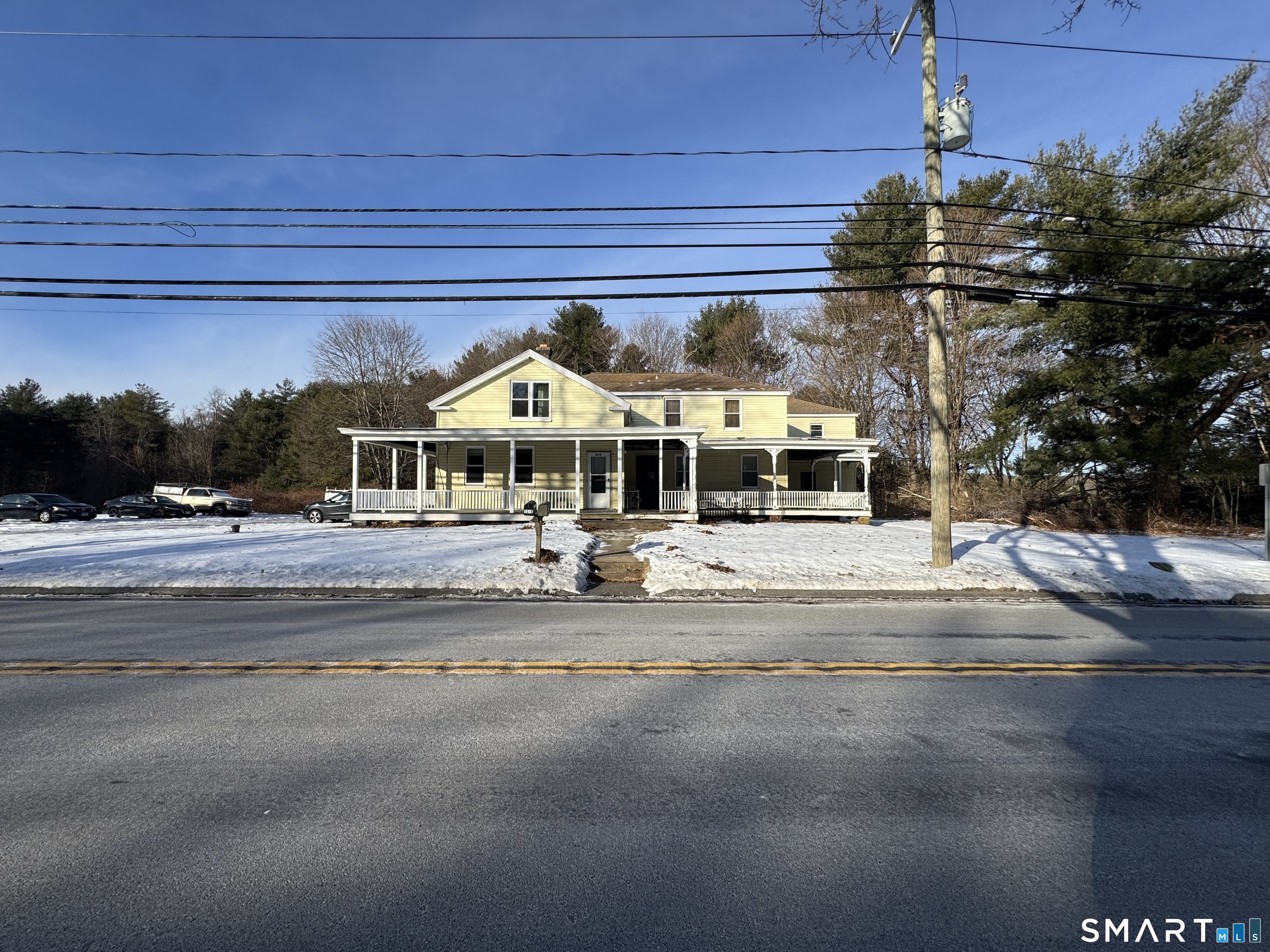 a front view of a house with a patio