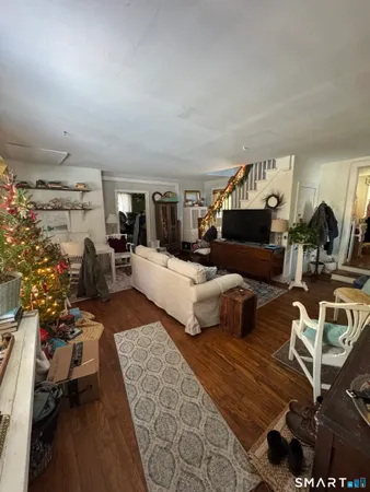 a room with furniture and a window