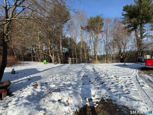 a view of road with trees