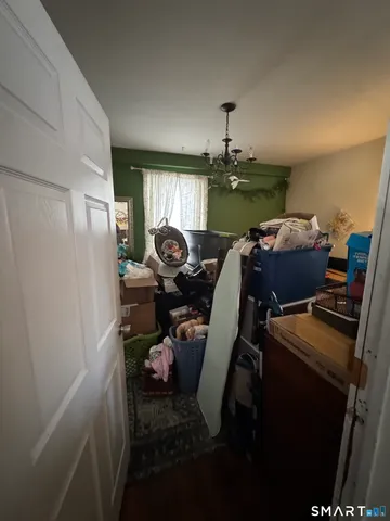 a bathroom with a sink toilet and a mirror