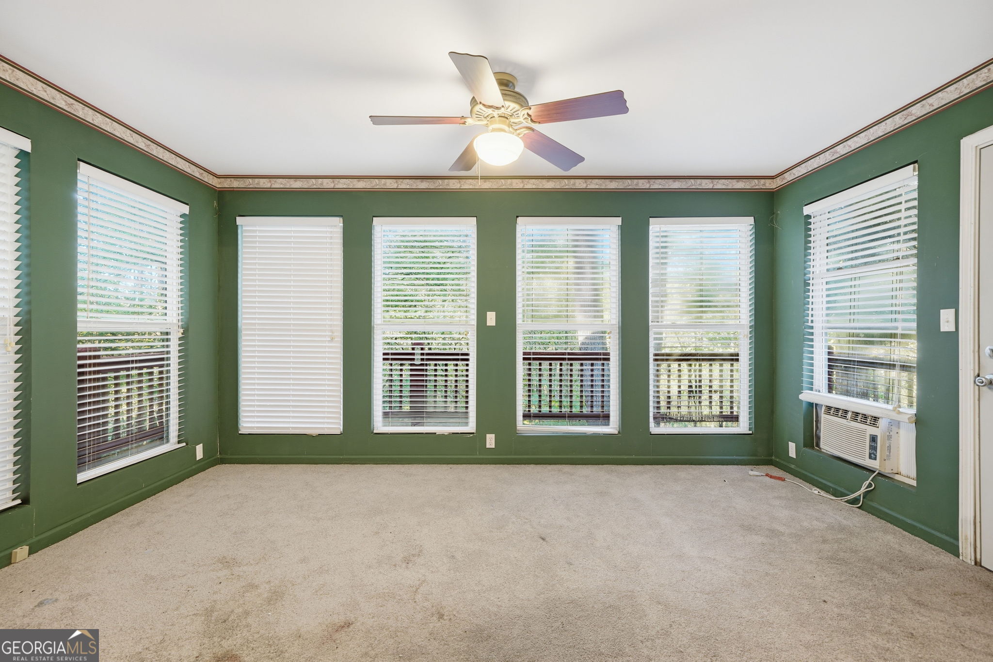 1907 John Call Road Ellijay, GA 30536 - Photo 13 of 41 a view of an empty room with a window and a kitchen