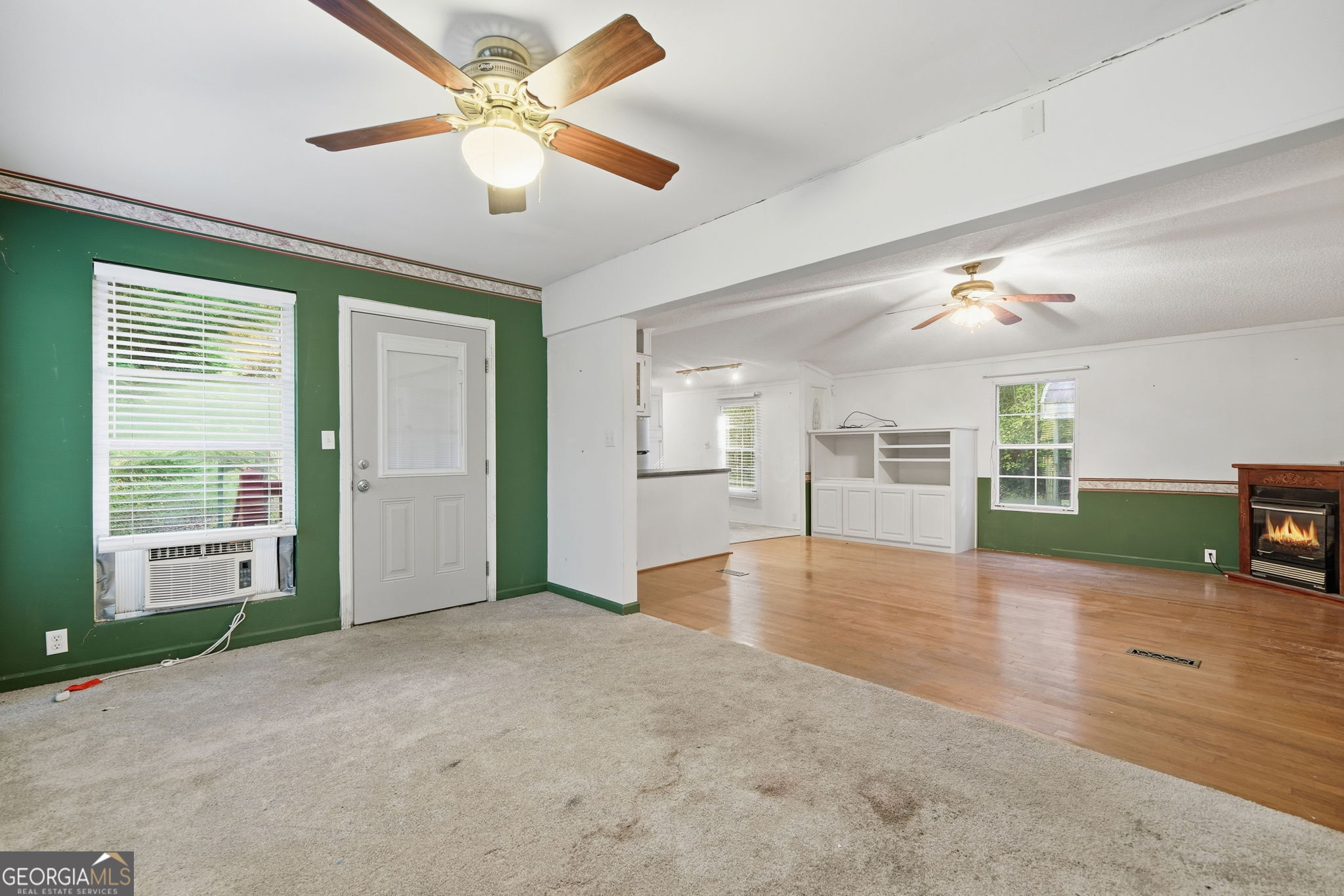 1907 John Call Road Ellijay, GA 30536 - Photo 27 of 41 a view of livingroom with hardwood floor and a ceiling fan