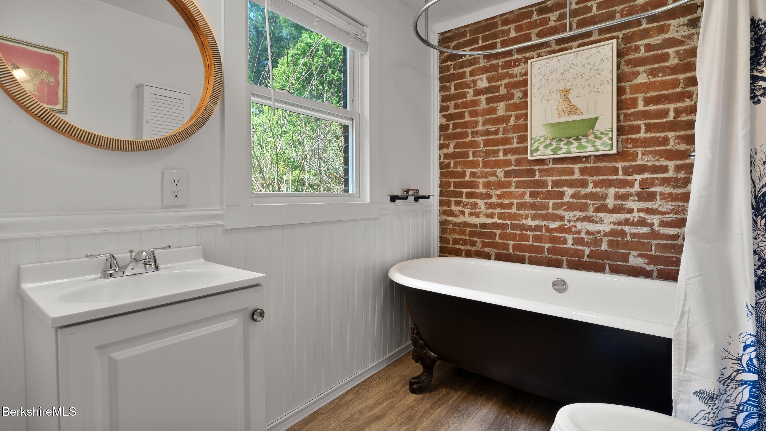 20 East Dugway Road Lenox, MA 01240 - Photo 62 of 84 a bathroom with a sink and a mirror
