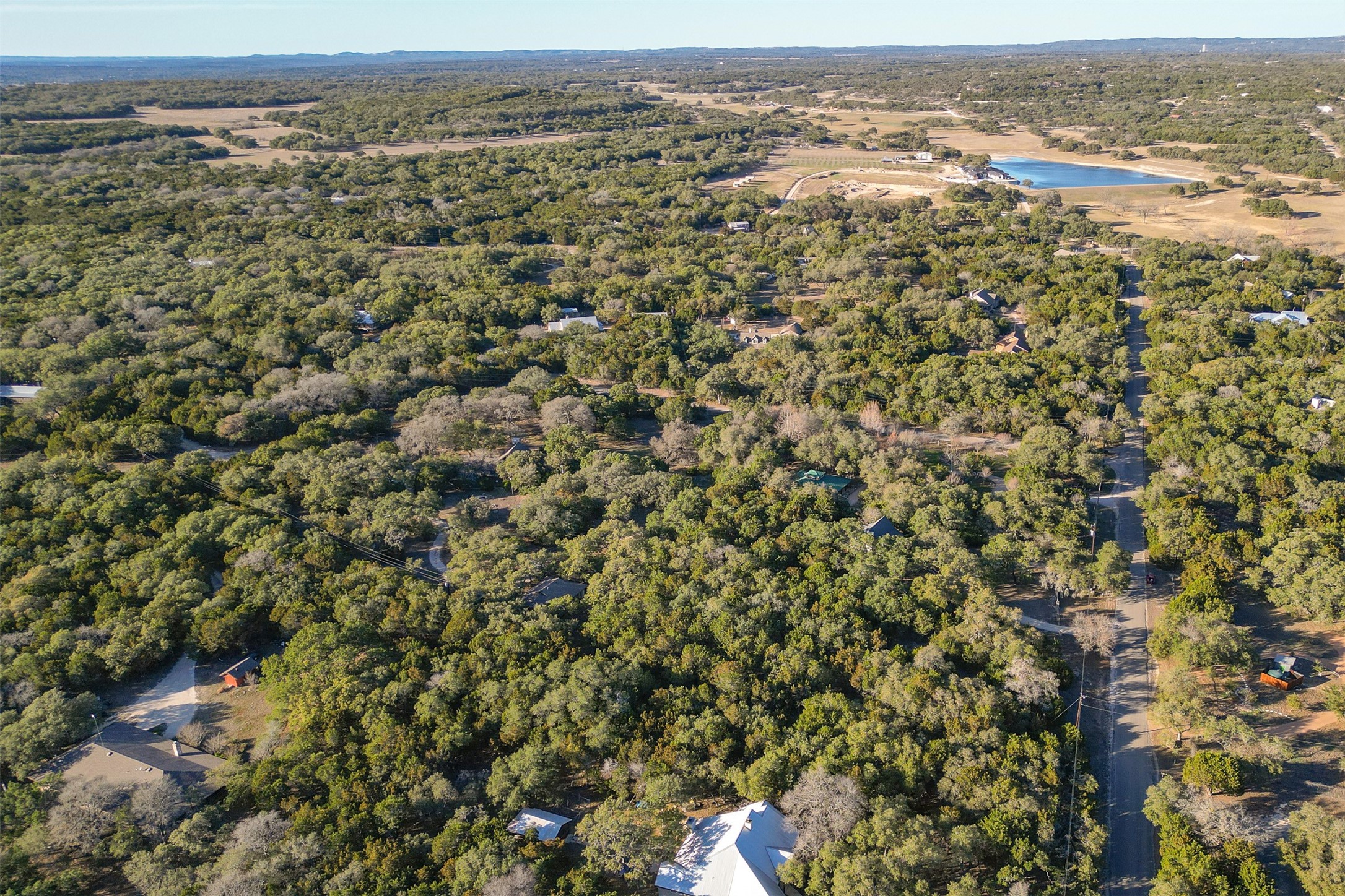 308 Ridge Oak Drive Wimberley, TX 78676 - Photo 18 of 29 an aerial view of houses with yard