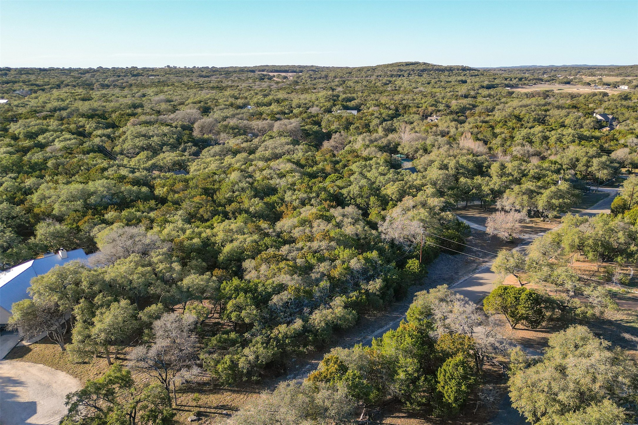 308 Ridge Oak Drive Wimberley, TX 78676 - Photo 3 of 29 view of city and mountain