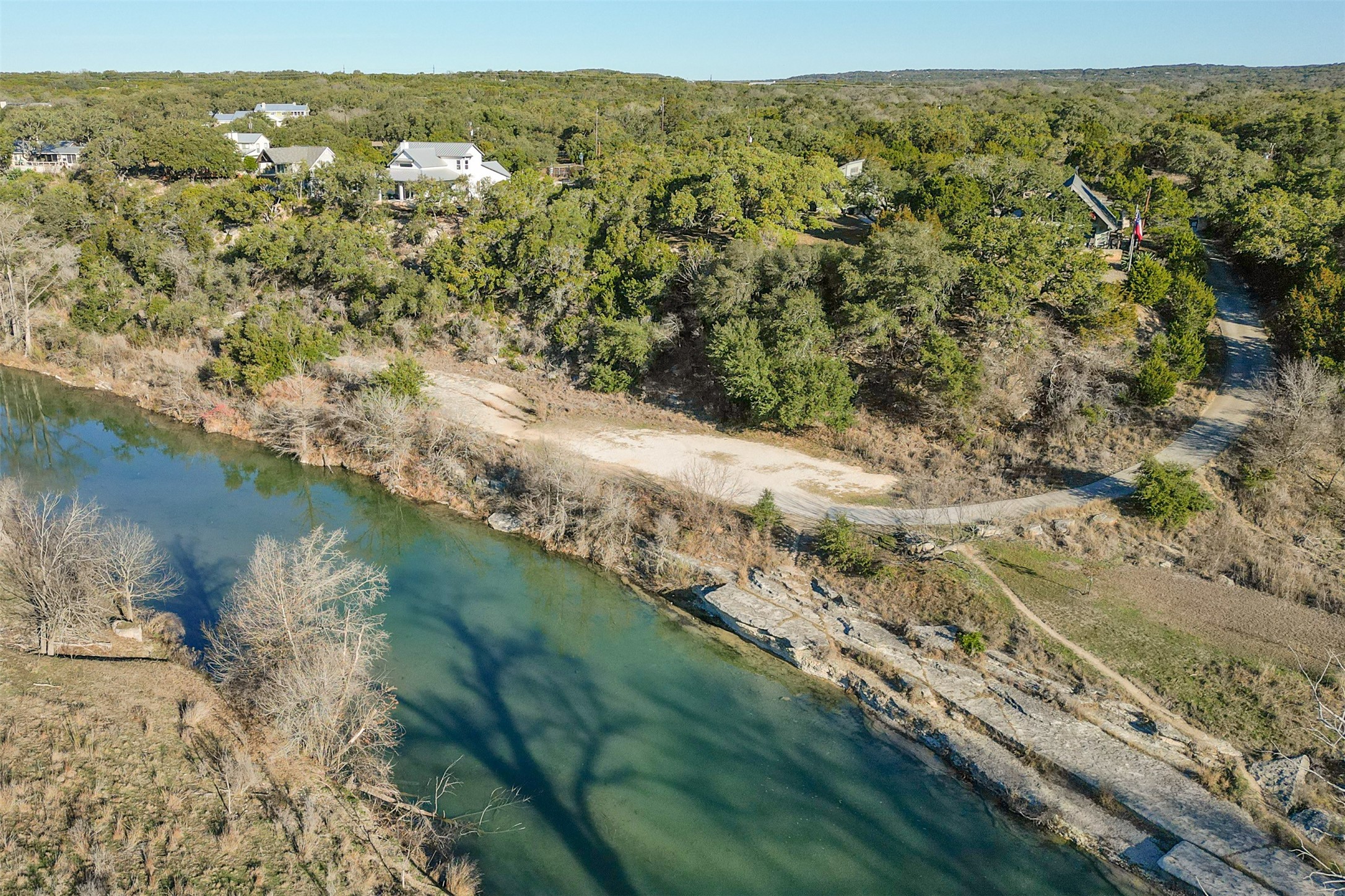 308 Ridge Oak Drive Wimberley, TX 78676 - Photo 10 of 29 a view of a lake with mountains in the background