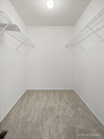 a view of a room with racks on the wall