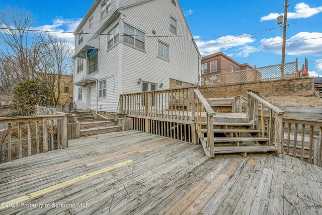 a view of a house with a deck