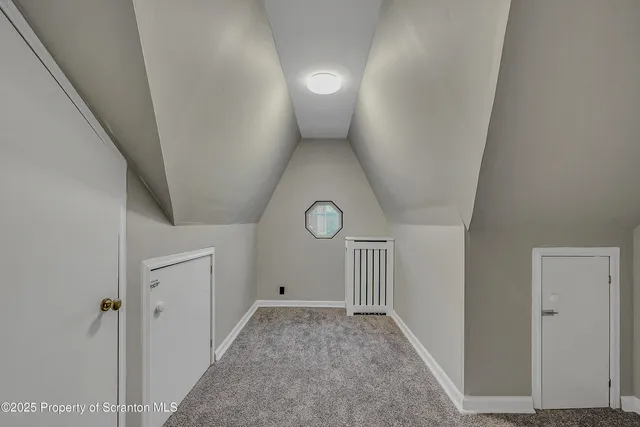 a view of a hallway with entryway