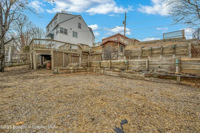 a view of a large house with large windows