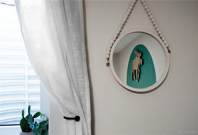 front view of a house with a tree