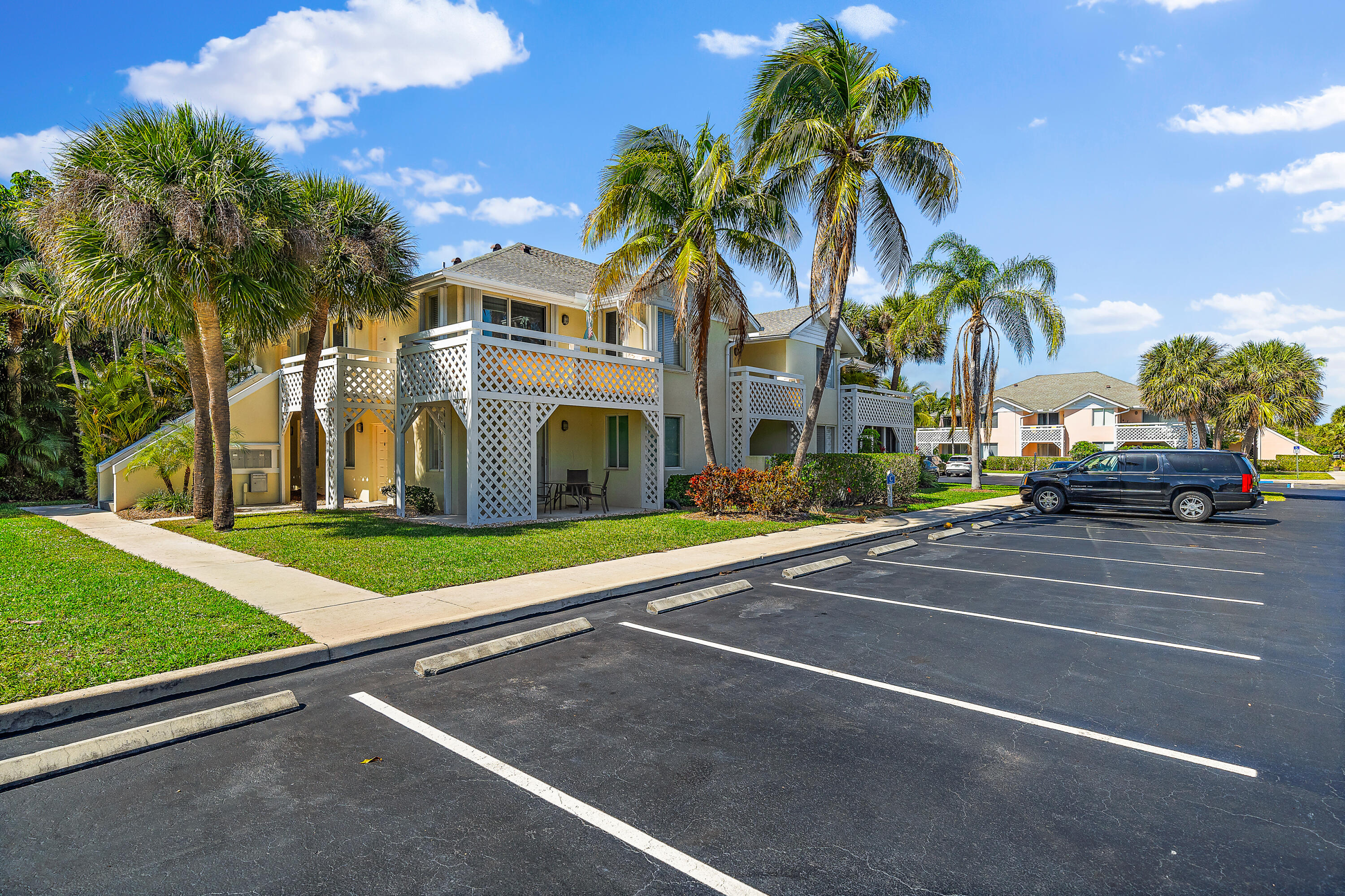 353 Highway 1, Unit C7 Jupiter, FL 33477 - Photo 22 of 25 a view of road with palm trees