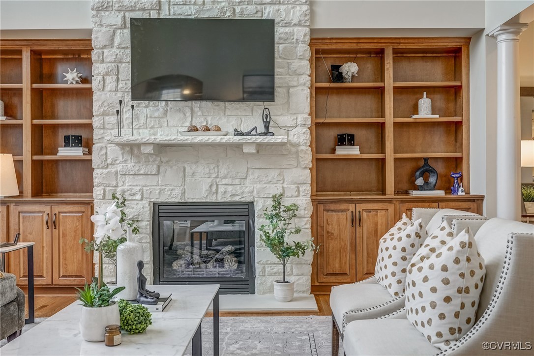 3412 Handley Road Midlothian, VA 23113 - Photo 12 of 50 a living room with furniture and a fireplace