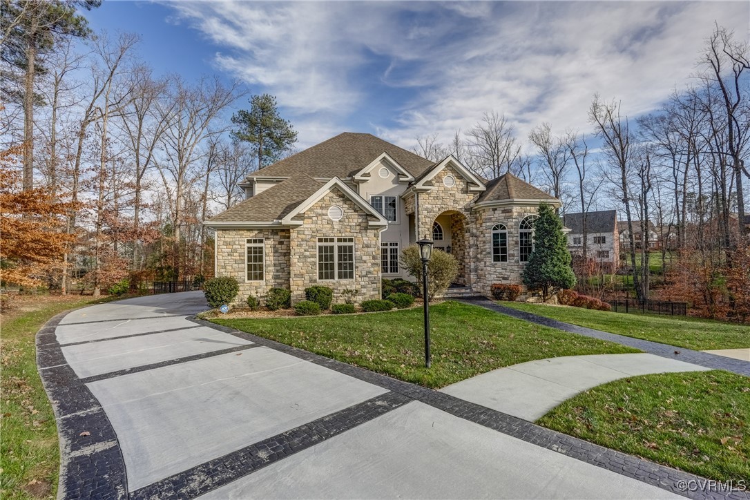 3412 Handley Road Midlothian, VA 23113 - Photo 2 of 50 a front view of a house with a yard