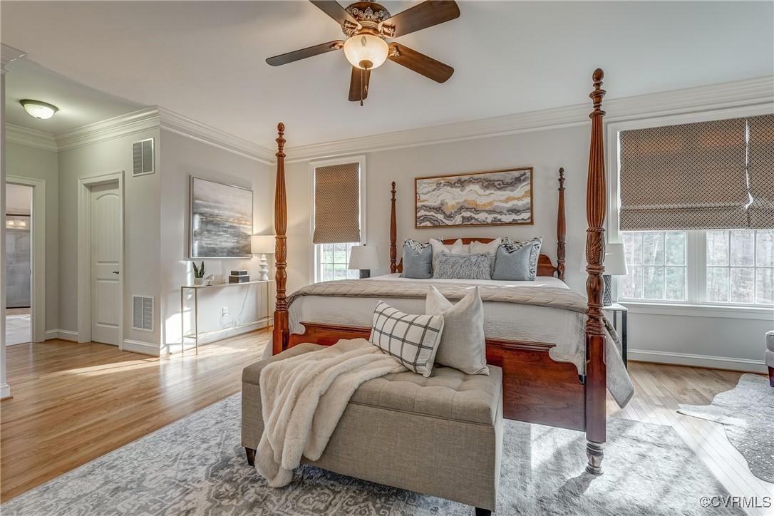 3412 Handley Road Midlothian, VA 23113 - Photo 27 of 50 a bedroom with a bed and glass walk in closet