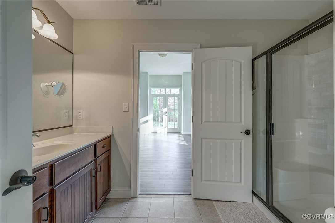 3412 Handley Road Midlothian, VA 23113 - Photo 37 of 50 a room view with a wooden floor and mirror