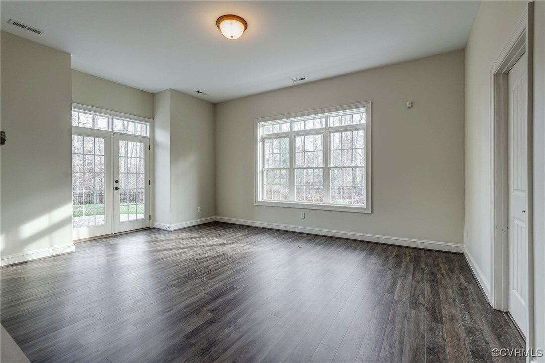 3412 Handley Road Midlothian, VA 23113 - Photo 44 of 50 an empty room with wooden floor and windows