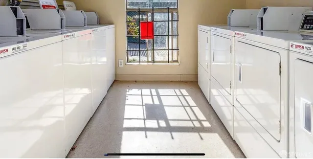 a view of a hallway with windows