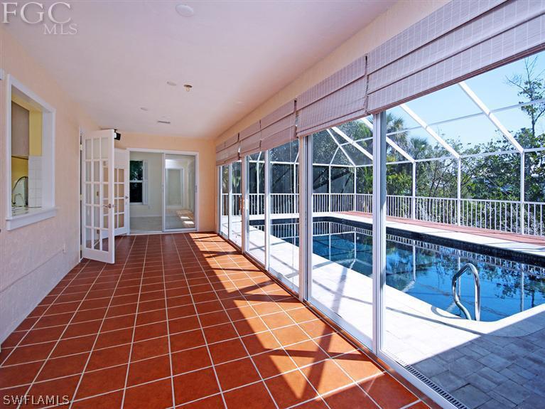 916 Beach Road Sanibel, FL 33957 - Photo 8 of 14 a view of a balcony with wooden floor